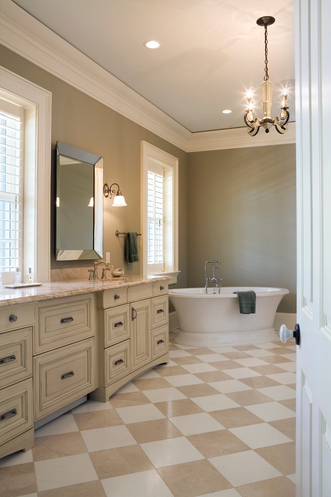 На фото: главная ванная комната среднего размера в современном стиле с столешницей из гранита, отдельно стоящей ванной, разноцветной плиткой, керамической плиткой и полом из керамической плитки с
