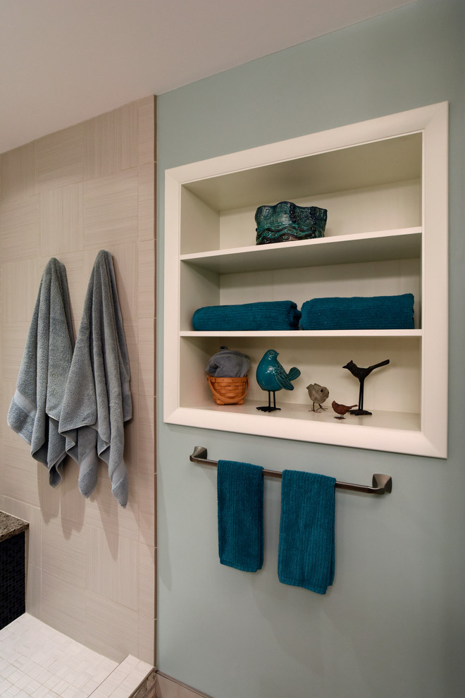 Inspiration pour une douche en alcôve design en bois brun avec un placard avec porte à panneau encastré, un carrelage noir, mosaïque, un mur bleu, un sol en carrelage de porcelaine, un lavabo encastré et un plan de toilette en granite.