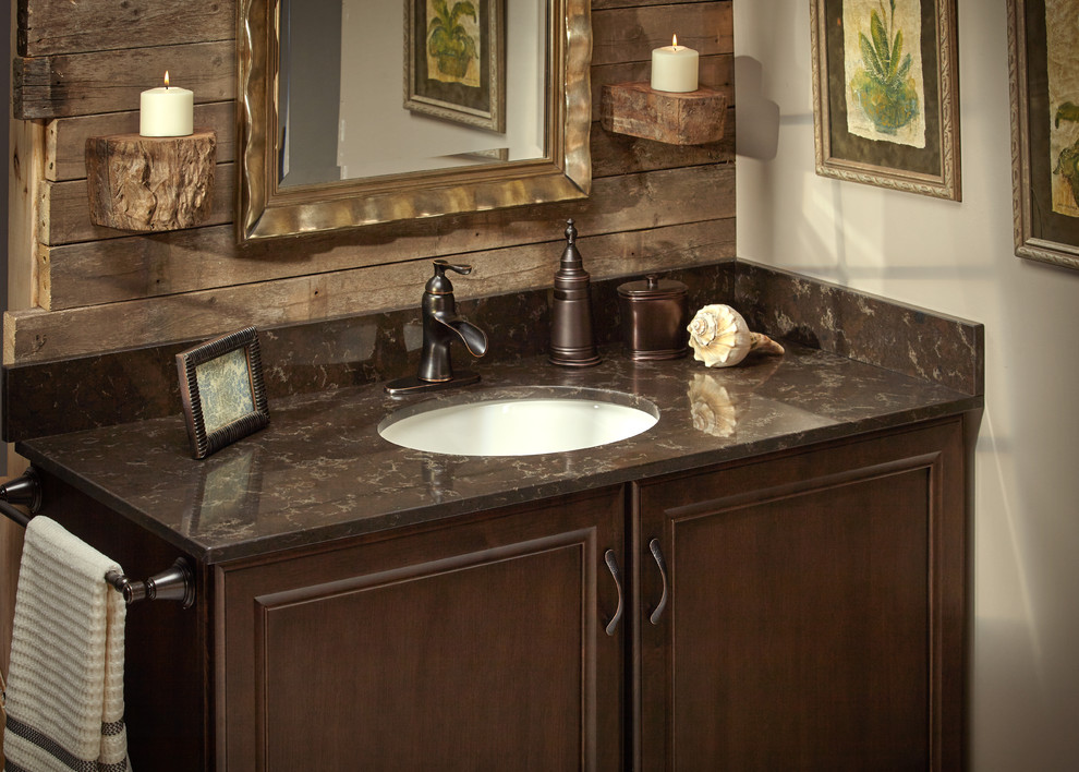 Example of a mid-sized tuscan 3/4 bathroom design in Atlanta with beaded inset cabinets, dark wood cabinets, beige walls, an undermount sink and quartz countertops