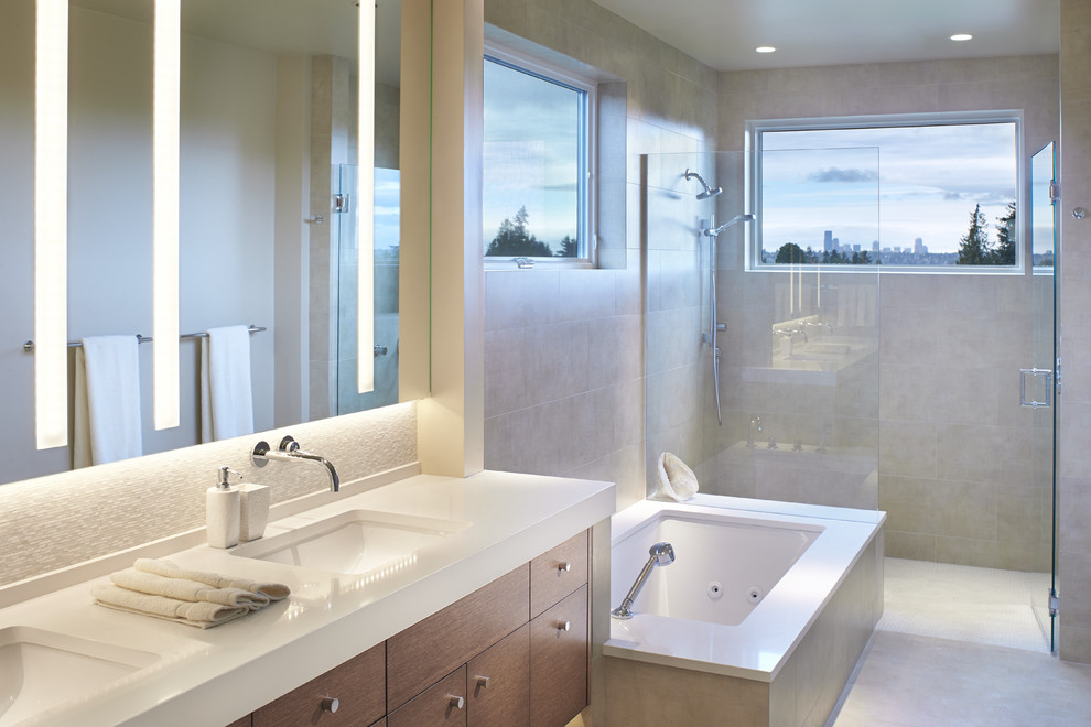 Inspiration for a mid-sized contemporary master white tile and porcelain tile porcelain tile walk-in shower remodel in Seattle with an undermount sink, flat-panel cabinets, medium tone wood cabinets, quartz countertops, an undermount tub, a one-piece toilet and white walls