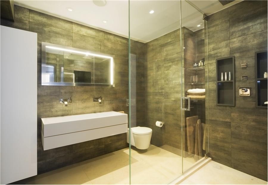 Источник вдохновения для домашнего уюта: главная ванная комната среднего размера в стиле модернизм с плоскими фасадами, белыми фасадами, угловым душем, инсталляцией, серой плиткой, цементной плиткой, серыми стенами, полом из керамогранита, раковиной с несколькими смесителями, столешницей из искусственного камня, бежевым полом и душем с распашными дверями