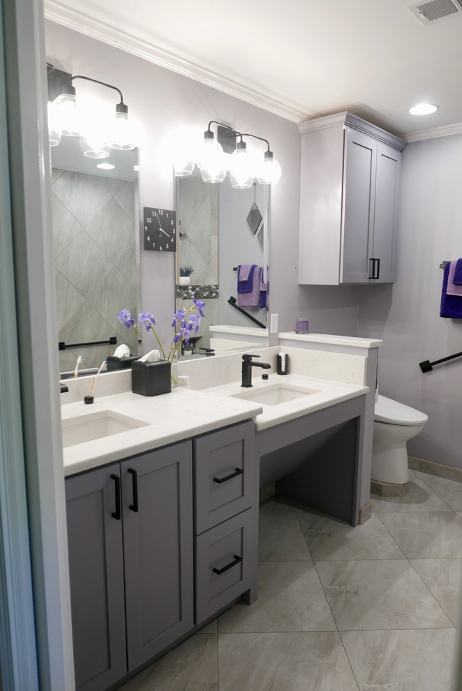 Bathroom - mid-sized tropical master gray tile and porcelain tile porcelain tile and gray floor bathroom idea in Other with shaker cabinets, gray cabinets, a bidet, gray walls, an undermount sink, quartz countertops and white countertops