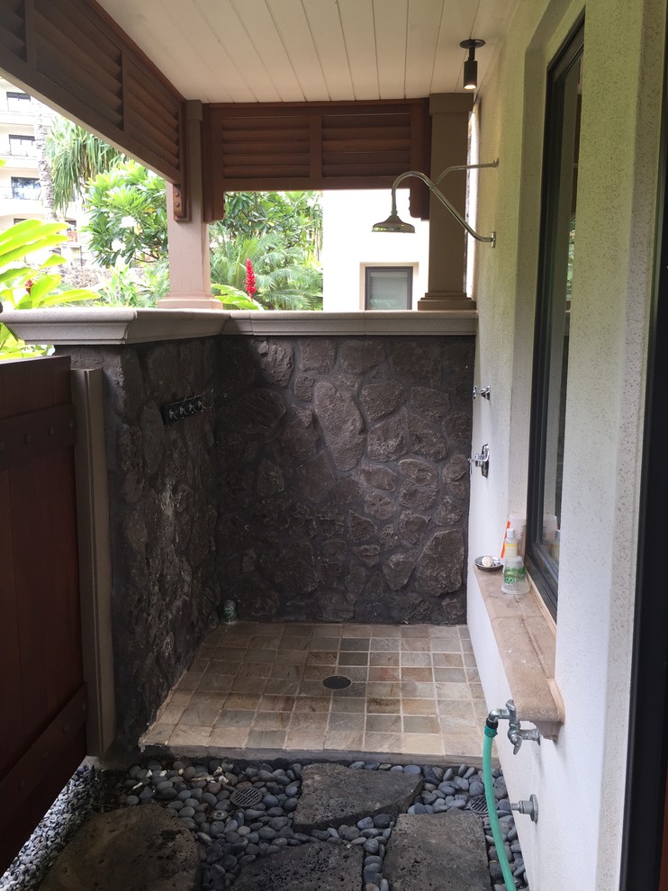 Large classic ensuite bathroom in Hawaii with a submerged sink, recessed-panel cabinets, dark wood cabinets, marble worktops, a freestanding bath, a corner shower, a two-piece toilet, beige tiles, stone tiles, white walls and limestone flooring.