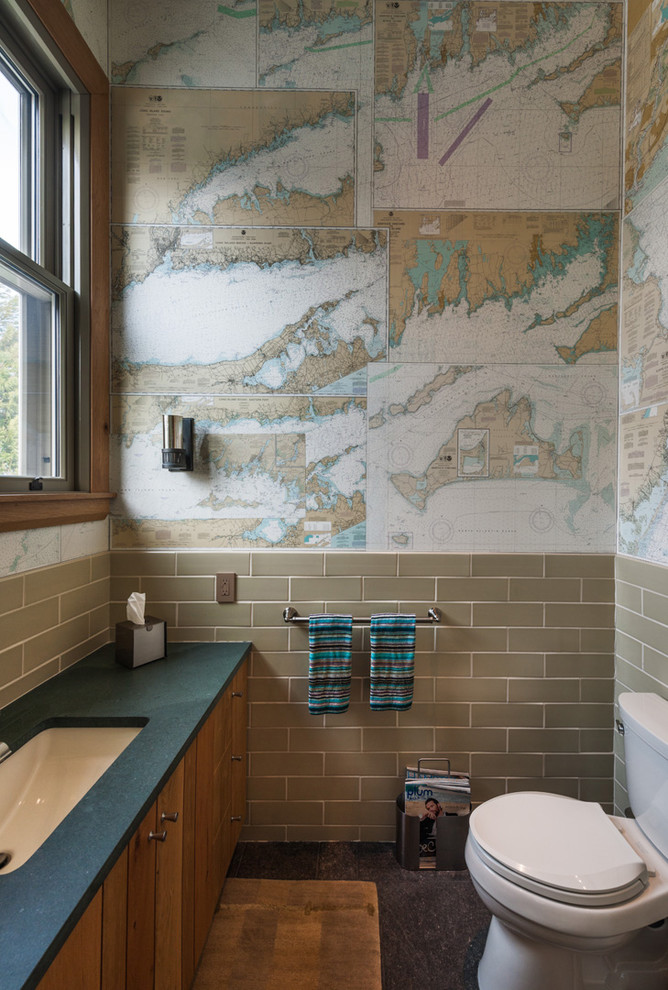 Example of a beach style subway tile bathroom design in New York with multicolored walls