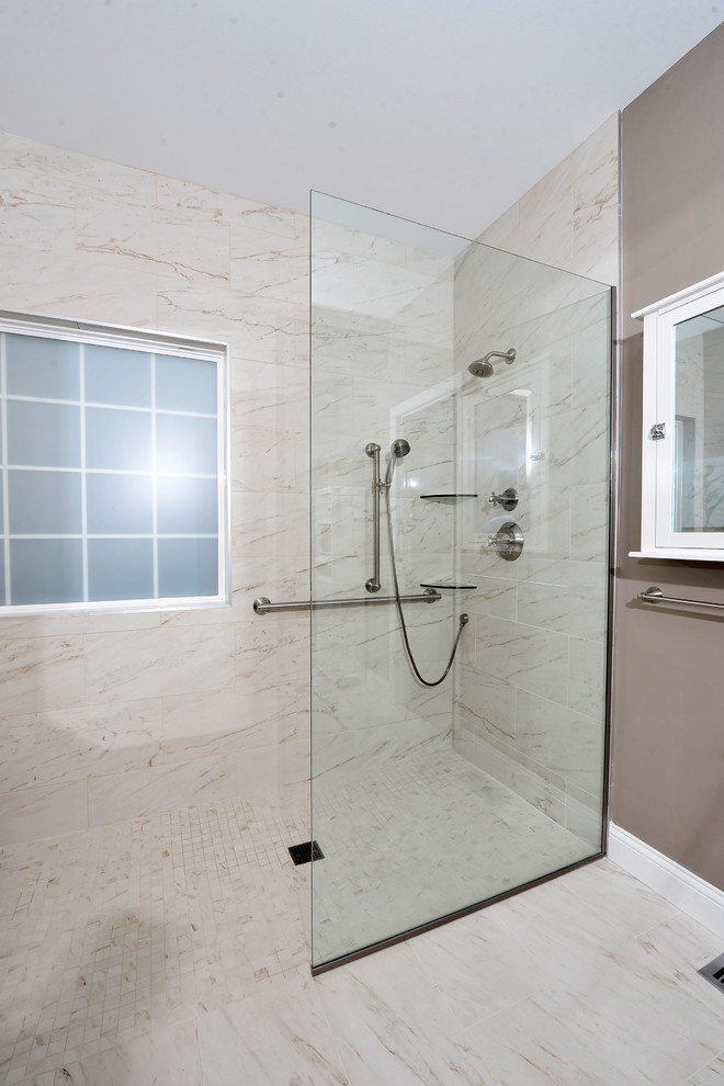Photo of a large contemporary ensuite bathroom in St Louis with shaker cabinets, dark wood cabinets, a built-in shower, grey tiles, white tiles, marble tiles, brown walls, marble flooring, a submerged sink, solid surface worktops, white floors, an open shower and brown worktops.