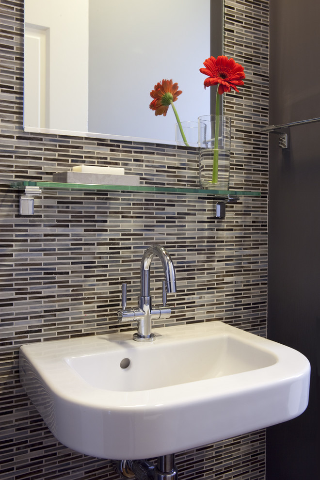 Photo of a contemporary half tiled bathroom in San Francisco with mosaic tiles.