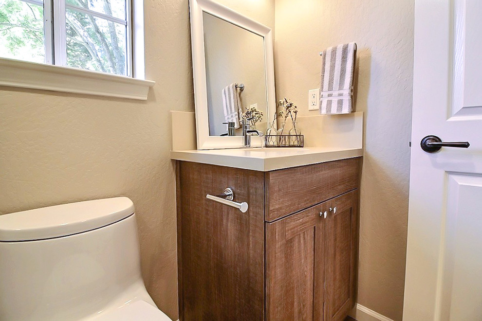 Inspiration for a small timeless 3/4 beige tile, white tile and mosaic tile travertine floor alcove shower remodel in San Francisco with shaker cabinets, light wood cabinets, a one-piece toilet, beige walls, an undermount sink and solid surface countertops