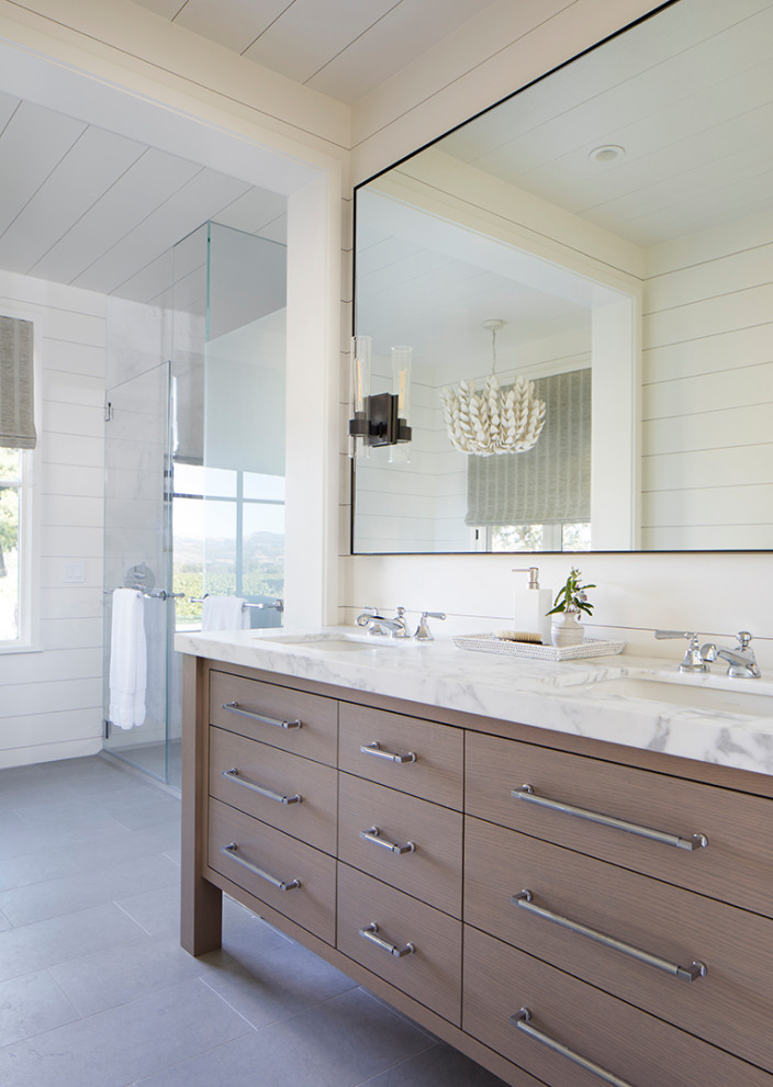 Rural bathroom in San Francisco with flat-panel cabinets, light wood cabinets, white walls, a submerged sink, grey floors, white worktops, double sinks, a freestanding vanity unit, a timber clad ceiling and tongue and groove walls.