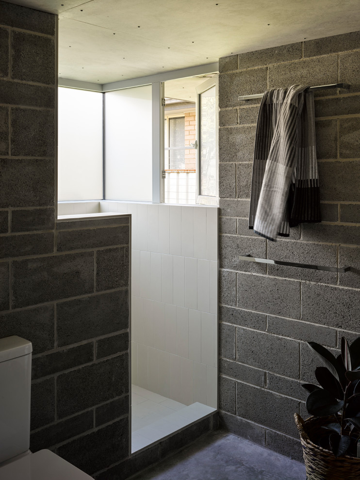 This is an example of a contemporary bathroom in Newcastle - Maitland.