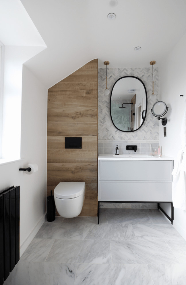Bild på ett funkis badrum, med marmorkakel och marmorgolv