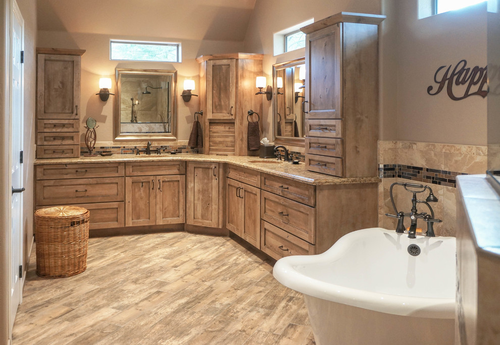 Photo of a medium sized rustic ensuite bathroom in Phoenix with brown cabinets, a claw-foot bath, a corner shower, a two-piece toilet, beige tiles, beige walls, a built-in sink, quartz worktops, beige floors and an open shower.