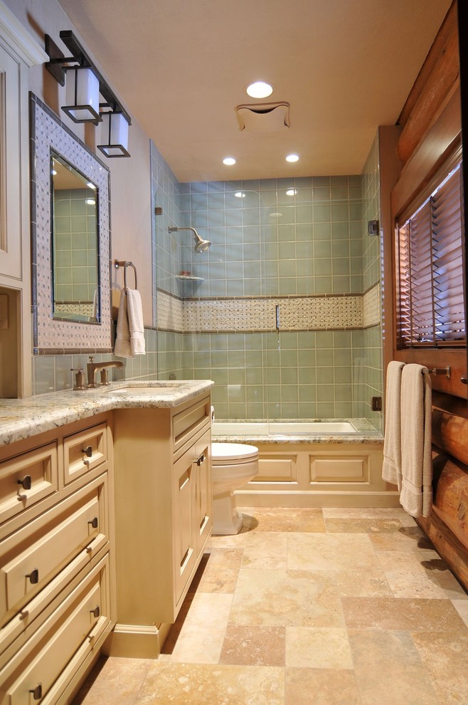 Inspiration for a mid-sized eclectic kids' green tile and ceramic tile bathroom remodel in Seattle with an undermount sink, raised-panel cabinets, white cabinets, granite countertops, a two-piece toilet and beige walls