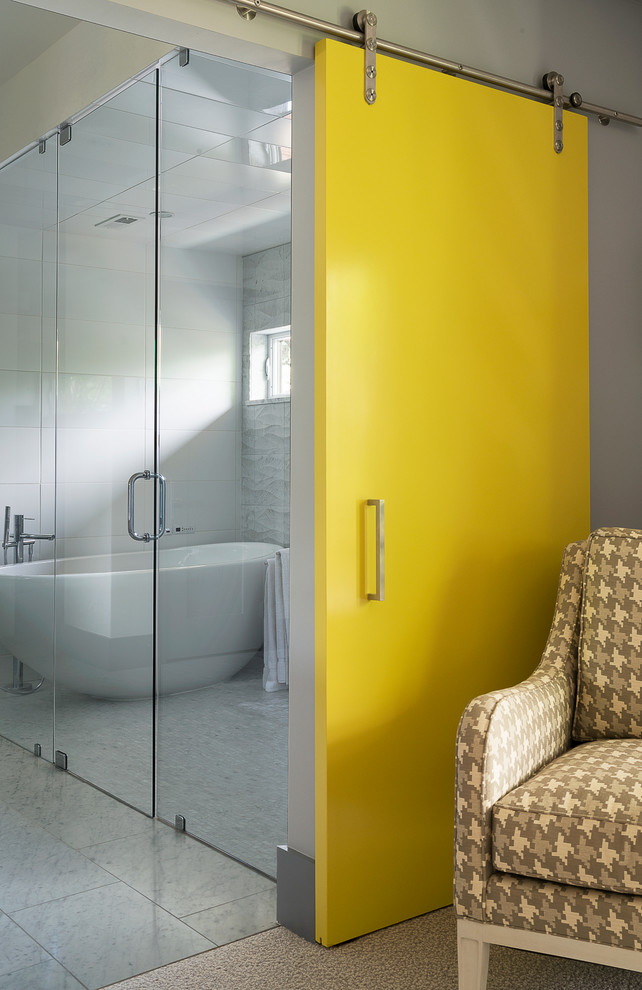 Design ideas for a contemporary grey and yellow bathroom in Denver with a freestanding bath, a built-in shower, white tiles and white walls.