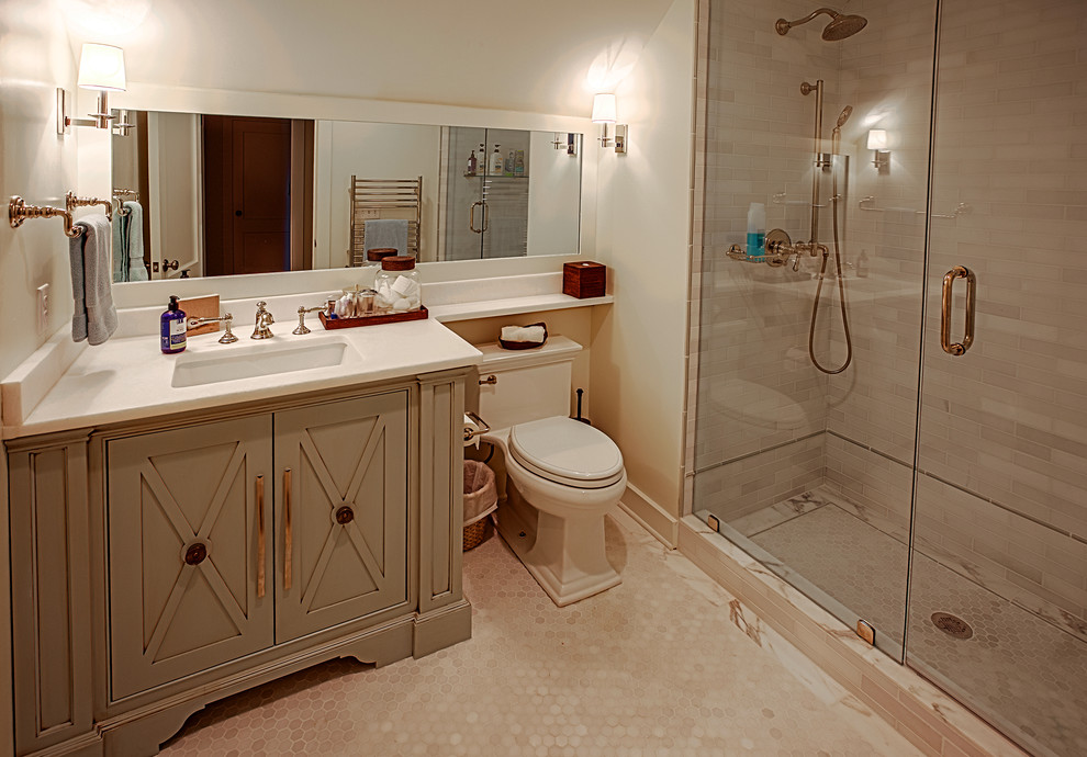 Design ideas for a medium sized nautical bathroom in Miami with grey cabinets, an alcove shower, a two-piece toilet, grey tiles, stone tiles, white walls, ceramic flooring, a submerged sink, solid surface worktops, beige floors and a hinged door.
