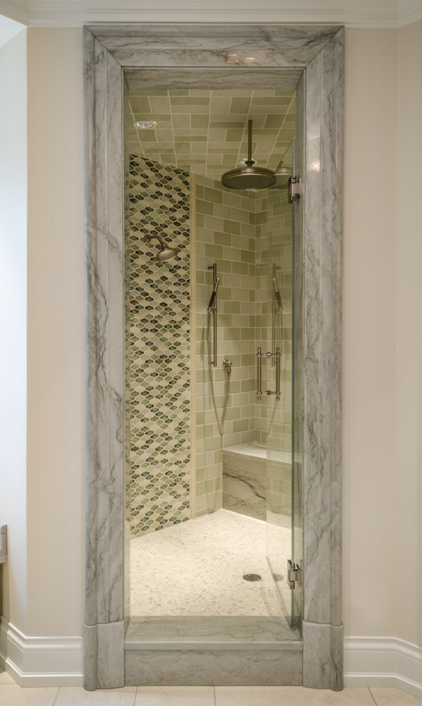 Inspiration for a transitional green tile porcelain tile corner shower remodel in Cleveland with quartzite countertops