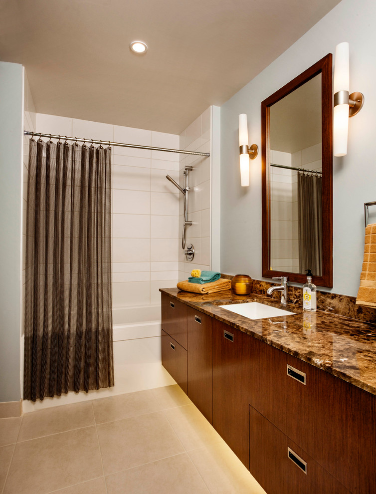 This is an example of a medium sized contemporary bathroom in Portland with flat-panel cabinets, an alcove bath, an alcove shower, beige tiles, ceramic tiles, porcelain flooring, a submerged sink, granite worktops and a shower curtain.