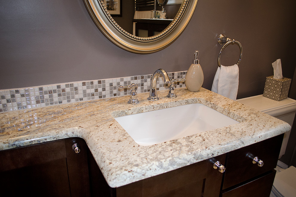 Mid-sized elegant master beige tile and ceramic tile porcelain tile bathroom photo in Philadelphia with an undermount sink, shaker cabinets, dark wood cabinets, granite countertops, a two-piece toilet and gray walls