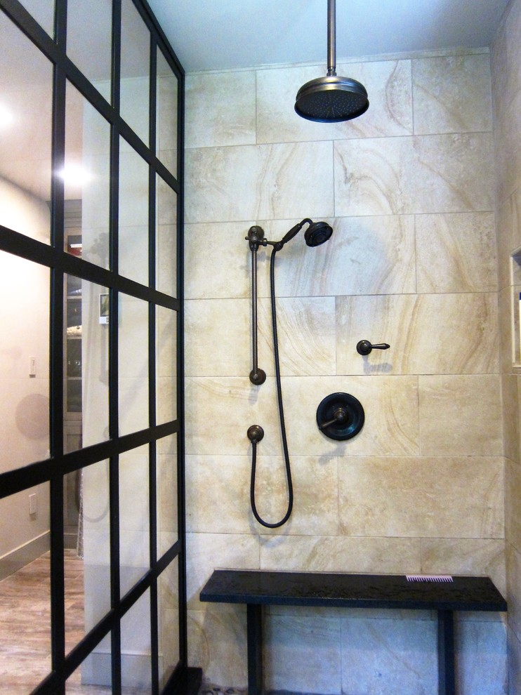This is an example of a medium sized urban ensuite bathroom in Philadelphia with a walk-in shower, beige walls and granite worktops.