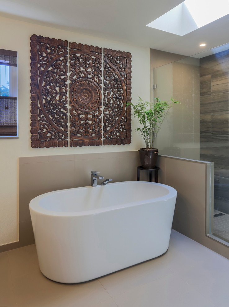 Mid-sized zen master beige tile and porcelain tile porcelain tile bathroom photo in Seattle with flat-panel cabinets, dark wood cabinets, a two-piece toilet, beige walls, an undermount sink and granite countertops