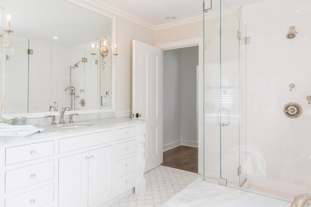 Small elegant master white tile and stone tile marble floor and white floor corner shower photo in Other with beaded inset cabinets, white cabinets, an undermount tub, a one-piece toilet, beige walls, an undermount sink, granite countertops, a hinged shower door and green countertops