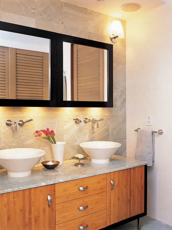 Example of a mid-sized trendy 3/4 ceramic tile bathroom design in New York with shaker cabinets, medium tone wood cabinets, multicolored walls, a drop-in sink and granite countertops