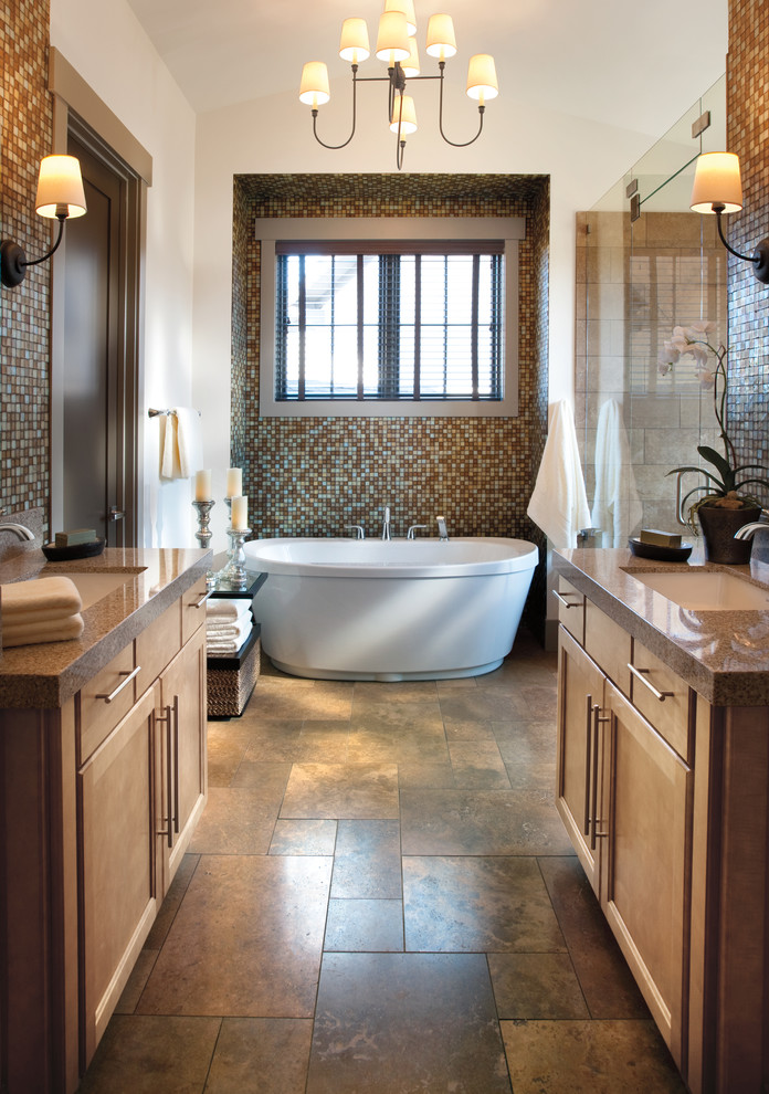 Mid-sized transitional master beige tile, brown tile, green tile and mosaic tile concrete floor and multicolored floor bathroom photo in Denver with recessed-panel cabinets, light wood cabinets, white walls, an undermount sink and granite countertops