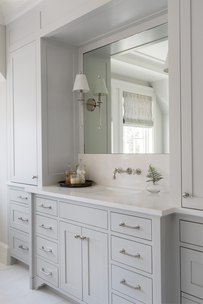 Inspiration for a large traditional grey and white ensuite bathroom in Boston with shaker cabinets, grey cabinets, grey walls, a submerged sink, grey floors, grey worktops, a single sink and a built in vanity unit.