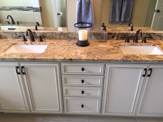 Inspiration for a mid-sized transitional master beige tile and glass tile ceramic tile and gray floor bathroom remodel in DC Metro with flat-panel cabinets, white cabinets, an undermount tub, an undermount sink and granite countertops