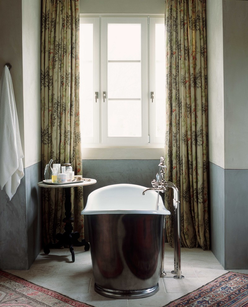 This is an example of a classic bathroom in Orange County with a freestanding bath.