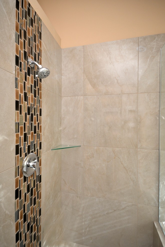 This is an example of a medium sized traditional ensuite bathroom in Boise with flat-panel cabinets, medium wood cabinets, a corner bath, a corner shower, a two-piece toilet, beige tiles, ceramic tiles, beige walls, ceramic flooring, a built-in sink, laminate worktops, beige floors and a hinged door.