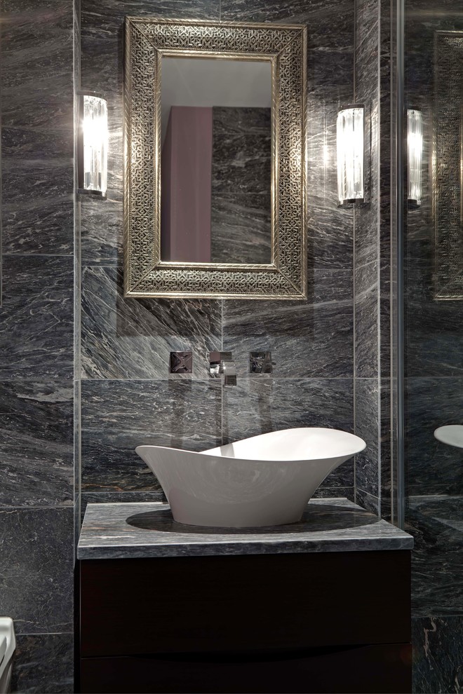 Idées déco pour une petite douche en alcôve contemporaine en bois foncé avec un plan vasque, un placard en trompe-l'oeil, un plan de toilette en marbre, WC suspendus, un carrelage gris, un carrelage de pierre, un mur gris et un sol en marbre.