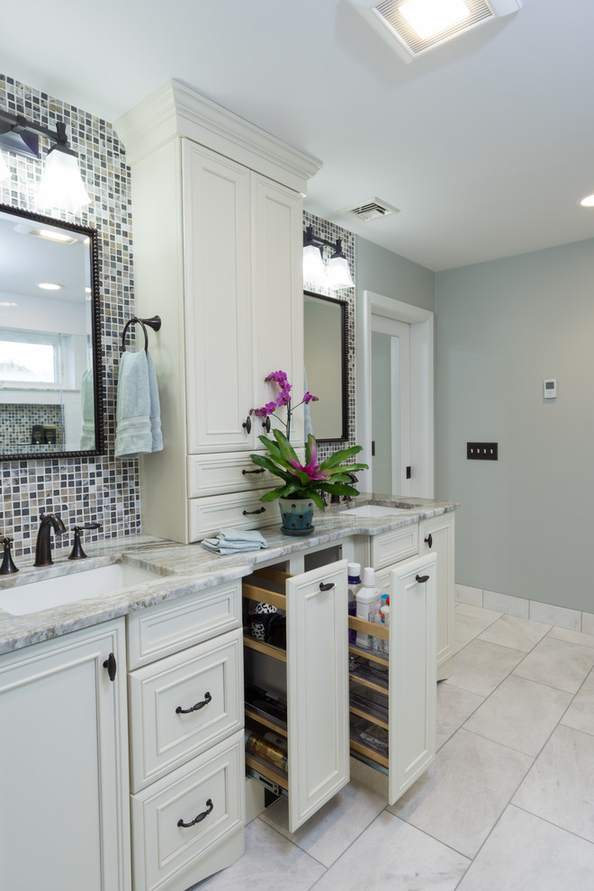 Example of a large transitional master white tile and subway tile marble floor doorless shower design in Providence with recessed-panel cabinets, white cabinets, granite countertops, a two-piece toilet, an undermount sink and green walls