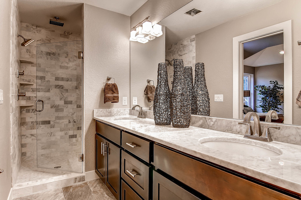 Example of a trendy white tile and stone tile bathroom design in Denver with an undermount sink, shaker cabinets and marble countertops