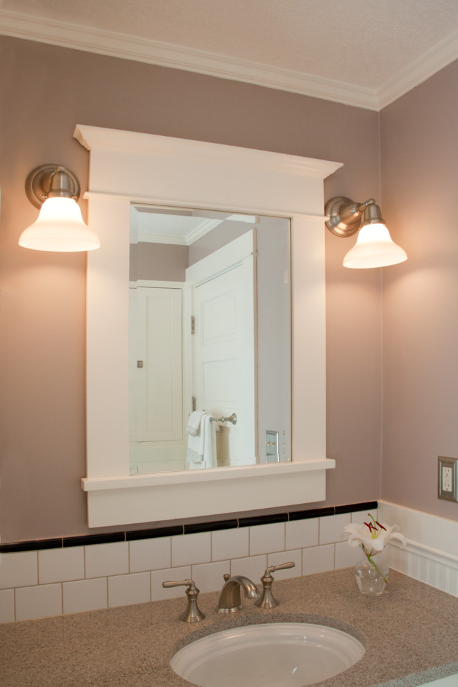 Example of a mid-sized arts and crafts 3/4 white tile and subway tile ceramic tile alcove shower design in Portland with an undermount sink, shaker cabinets, white cabinets, quartz countertops, a two-piece toilet and beige walls