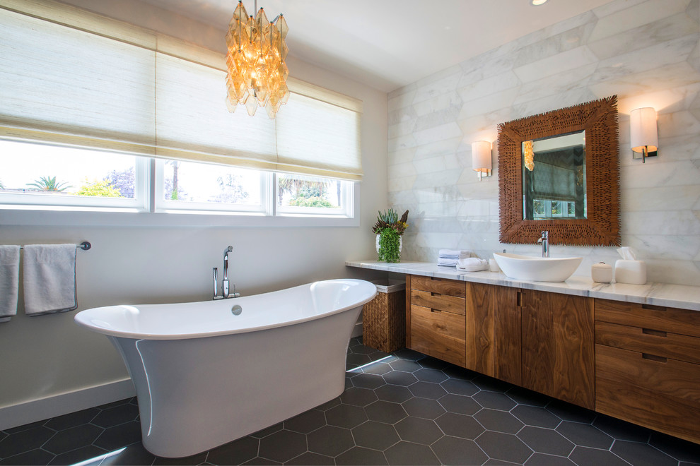 Inspiration for a classic ensuite bathroom in Los Angeles with flat-panel cabinets, medium wood cabinets, a freestanding bath, white walls and a vessel sink.