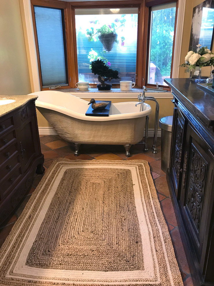 Mid-sized master beige tile porcelain tile and brown floor bathroom photo in Los Angeles with furniture-like cabinets, dark wood cabinets, a bidet, beige walls, an undermount sink, quartz countertops, a hinged shower door and beige countertops