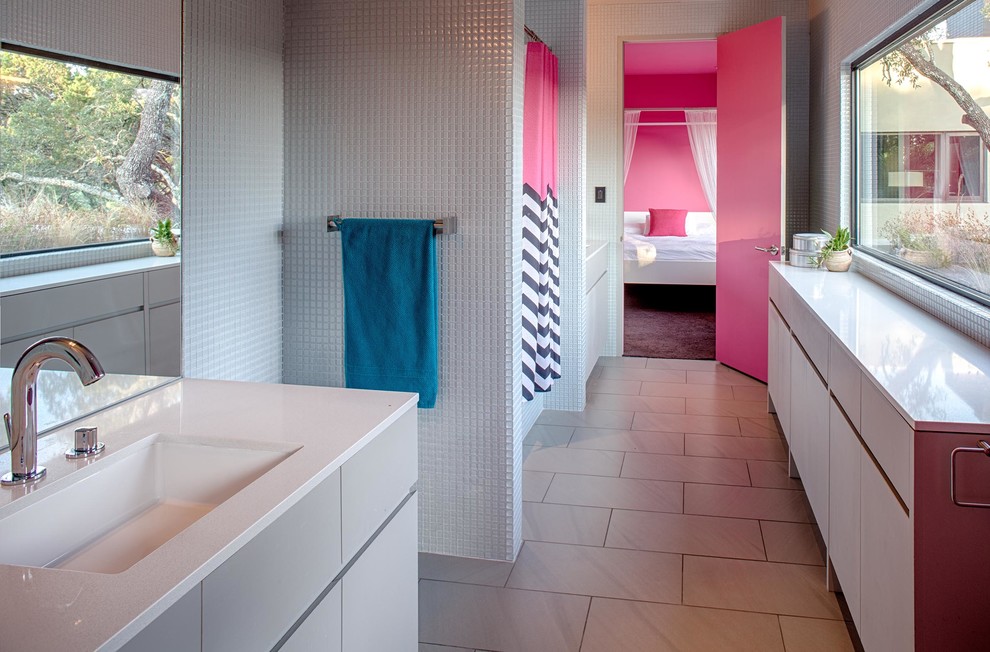 Contemporary bathroom in Austin with white tiles, mosaic tiles, a shower curtain and white worktops.