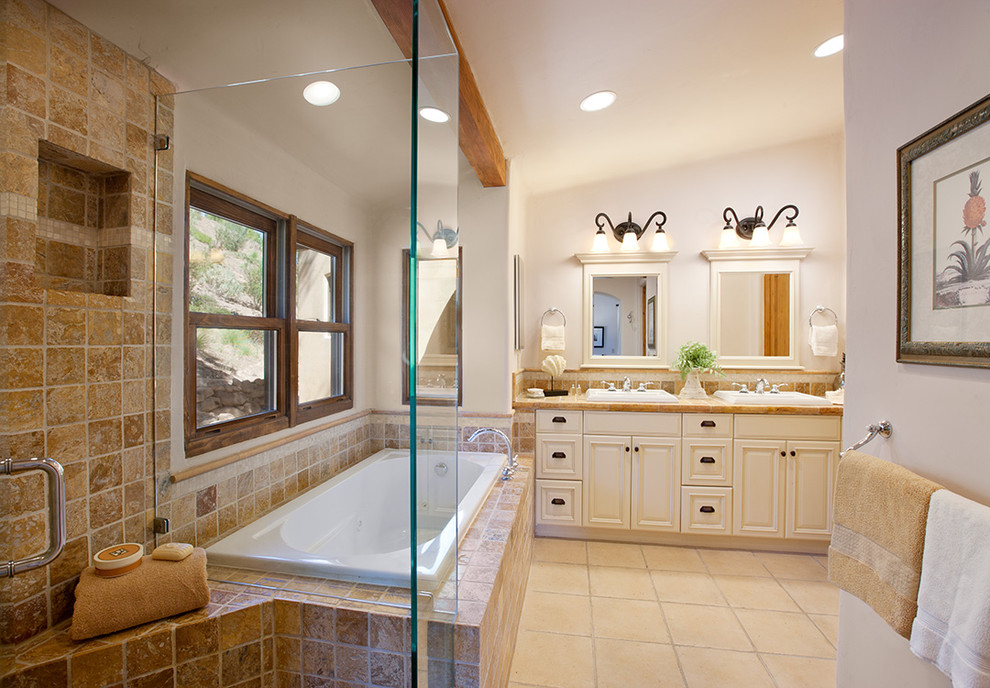 Example of a trendy bathroom design in Santa Barbara with beige cabinets