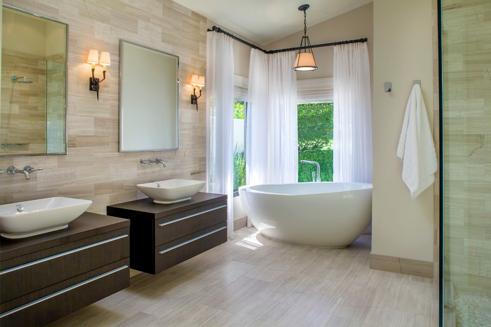 Example of an island style bathroom design in Tampa