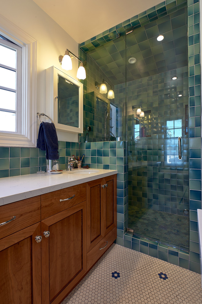Bathroom - large transitional master green tile and ceramic tile porcelain tile and white floor bathroom idea in San Francisco with shaker cabinets, medium tone wood cabinets, a two-piece toilet, white walls, an undermount sink, quartz countertops, a hinged shower door and white countertops