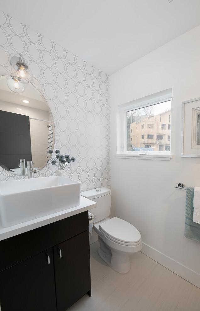 Classic shower room bathroom in Seattle with flat-panel cabinets, black cabinets, a two-piece toilet, white walls, a vessel sink and beige floors.