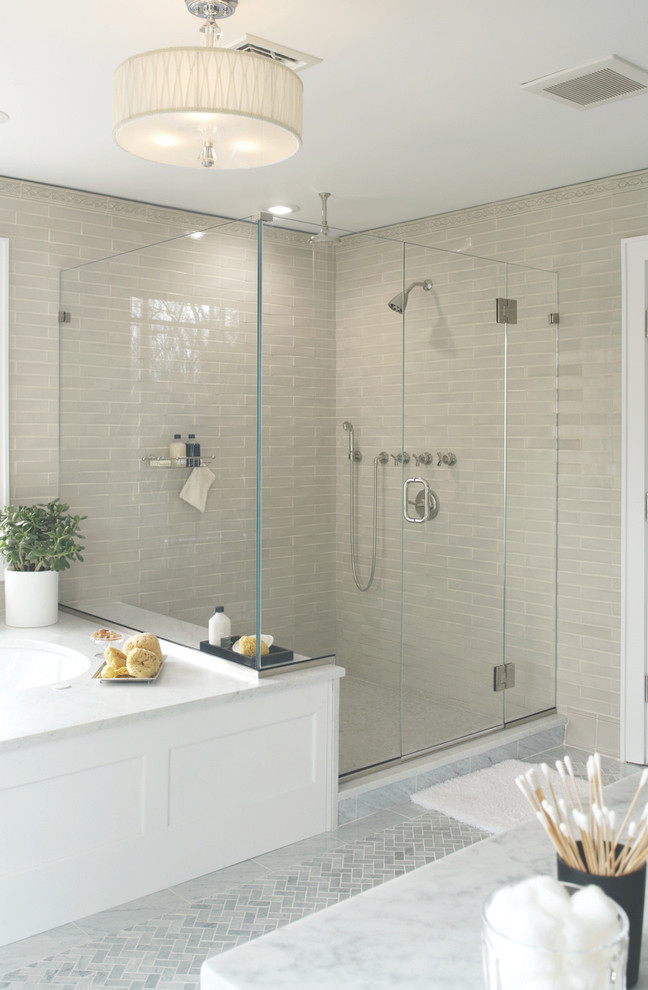 Inspiration for a transitional alcove shower remodel in New York