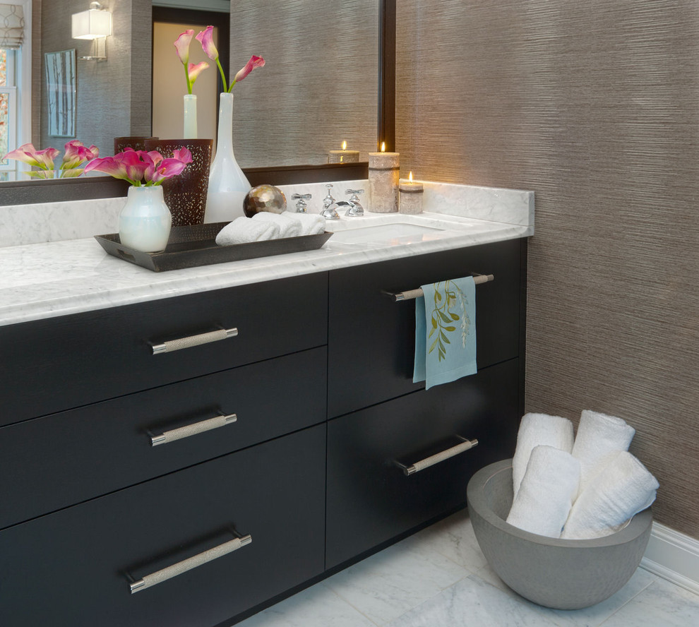 Bathroom - transitional bathroom idea in New York with flat-panel cabinets and black cabinets