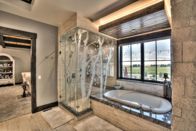 Example of a large arts and crafts master gray tile and stone tile gray floor bathroom design in Orange County with gray walls, granite countertops and a hinged shower door