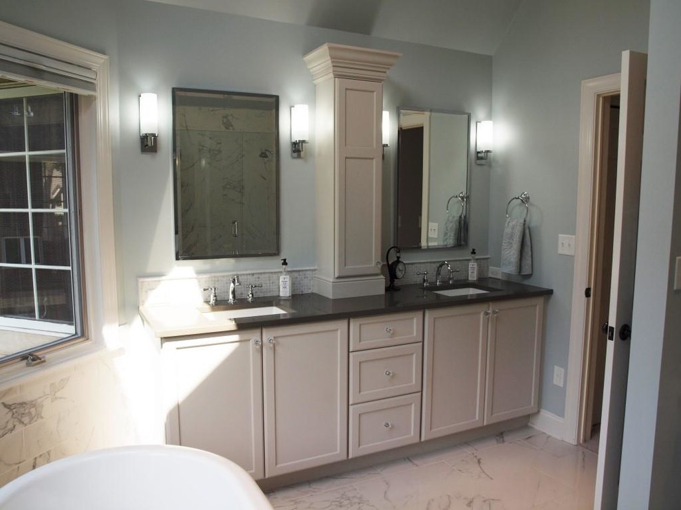 Bathroom - large traditional master blue tile and porcelain tile porcelain tile and white floor bathroom idea in Chicago with shaker cabinets, white cabinets, a two-piece toilet, blue walls, an undermount sink, quartz countertops and a hinged shower door