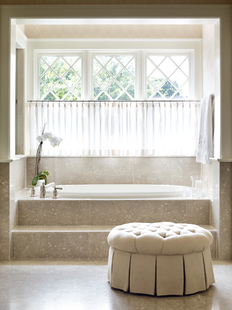 Mid-sized elegant master beige tile and limestone tile limestone floor bathroom photo in Charlotte with beige walls and recessed-panel cabinets