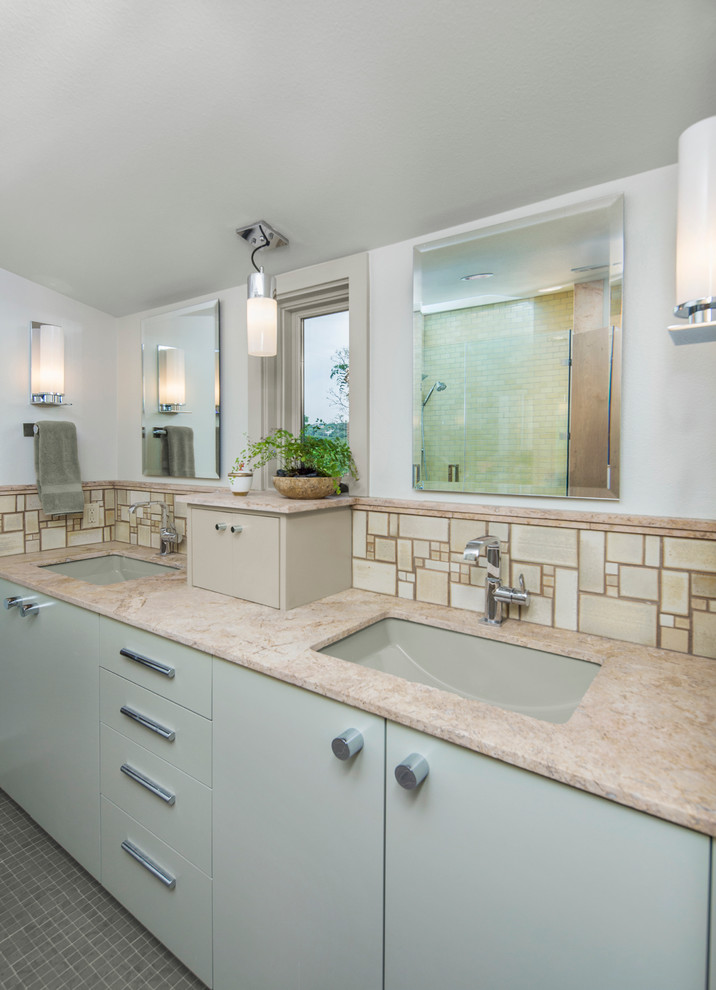 Mid-sized trendy master terra-cotta tile and beige tile mosaic tile floor alcove bathtub photo in Austin with an undermount sink, flat-panel cabinets, gray cabinets, marble countertops and gray walls