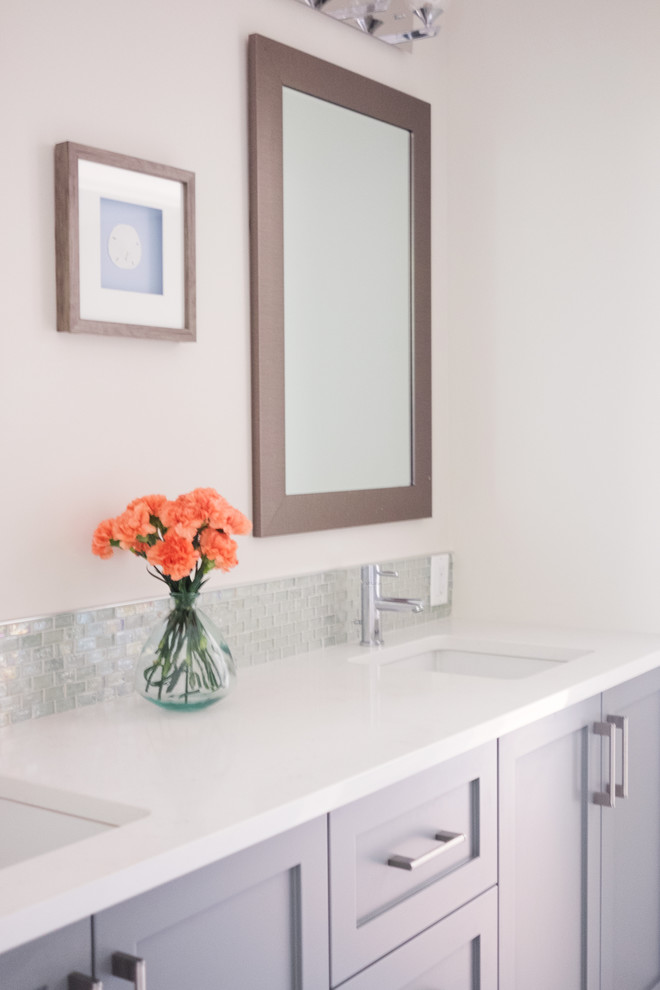 Bathroom - mid-sized coastal kids' multicolored tile and porcelain tile porcelain tile bathroom idea in Ottawa with shaker cabinets, gray cabinets, a one-piece toilet, gray walls, an undermount sink and quartzite countertops