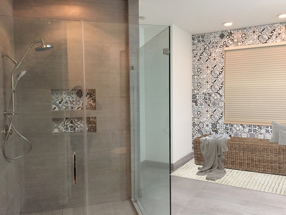 Corner shower - large contemporary master multicolored tile and ceramic tile cement tile floor and gray floor corner shower idea in Miami with flat-panel cabinets, light wood cabinets, a two-piece toilet, white walls and a hinged shower door