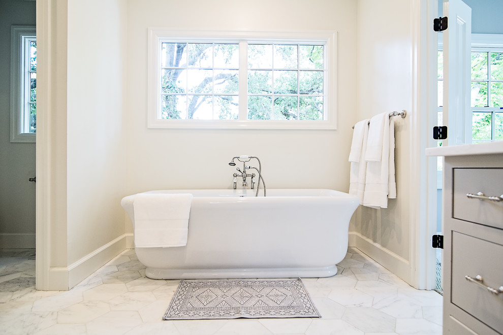 Example of a large classic master white tile and stone tile marble floor bathroom design in Austin with raised-panel cabinets, gray cabinets, a two-piece toilet, white walls, an undermount sink and marble countertops